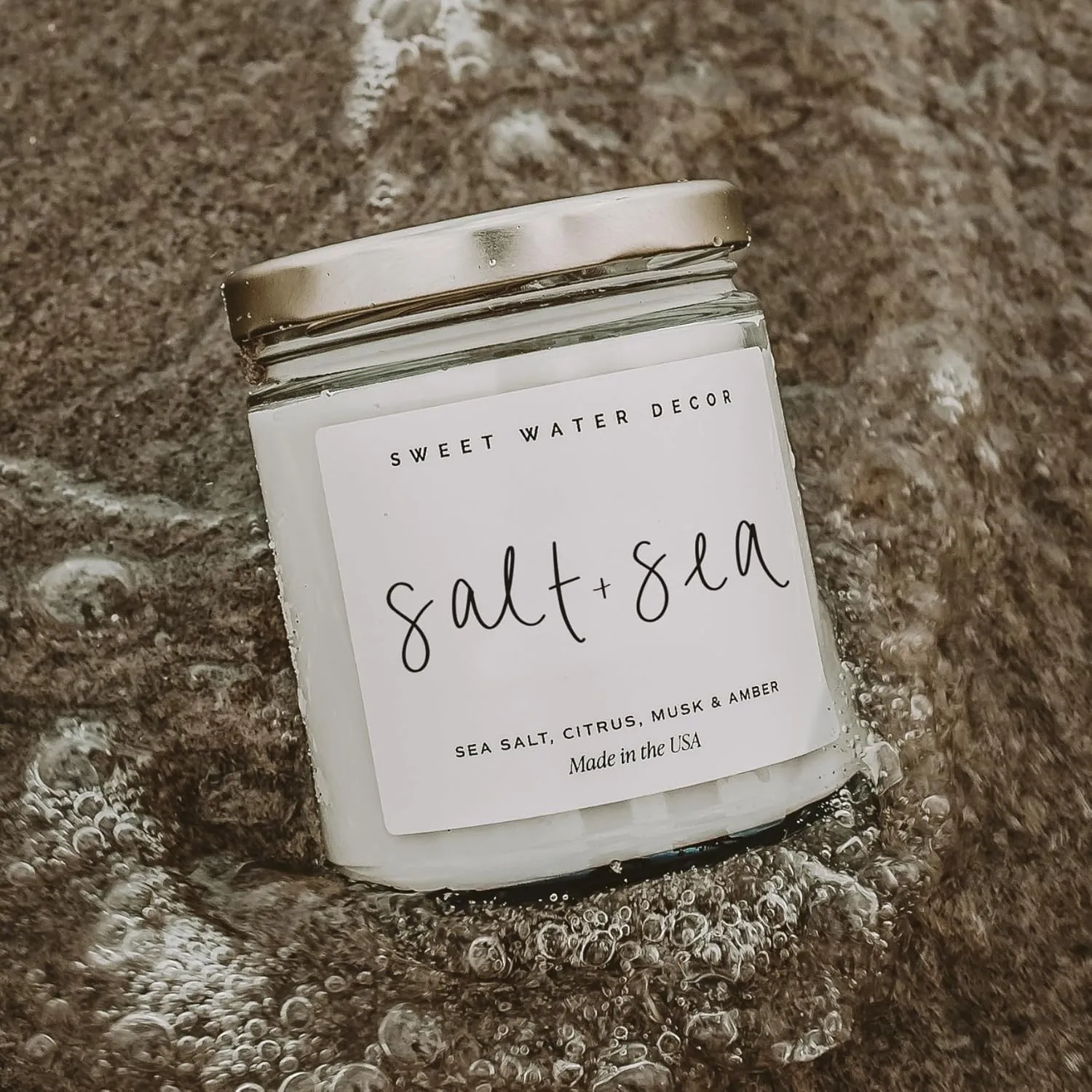 Sweet Water Decor Salt and Sea Candle - Sea Salt, Citrus, Amber, Musk, Beach Scented Soy Candles for Home - Coastal Decor for Beach Lovers - 9oz Clear Jar, 40 Hour Burn Time, Made in The USA